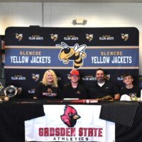 Aiden Johnson with his parents and brother.