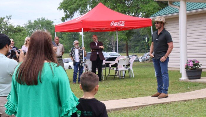 Owner Drake White addressing the crowd.