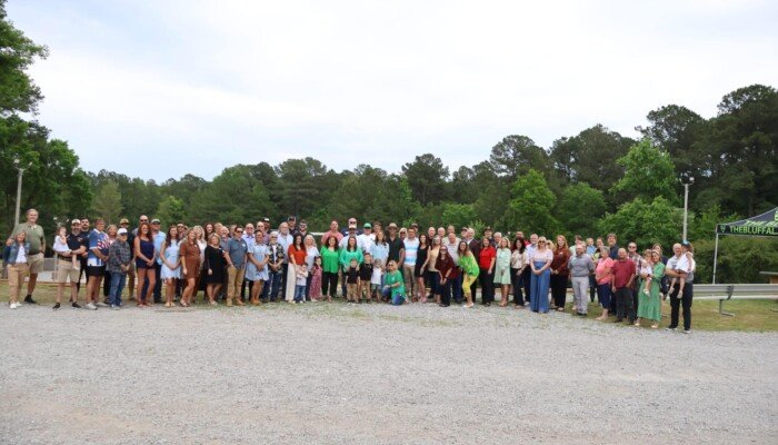 The whole crowd at the ribbon cutting.