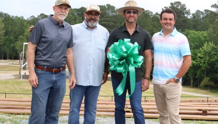 The owners and Etowah County Commissioner Tim Ramsey.