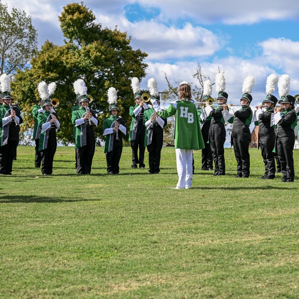 Hokes Bluff High School’s Green Machine Marching Band earned grand champion honors Saturday, Oct. 17, at Jacksonville State University’s Gem of the Hills Marching Invitational.
The competition was hosted by JSU’s Marching Southerners as a fundraiser for their upcoming trip to perform in the Rose Parade.
Hokes Bluff received superior ratings in all categories and won Best in Class AA awards for drum major, majorette, percussion and band.
The Green Machine also earned Best in Division A/AA honors in drum major, majorette and percussion before capping the competition by being named Grand Champion Band in Division A/AA.
By Alex Chaney.