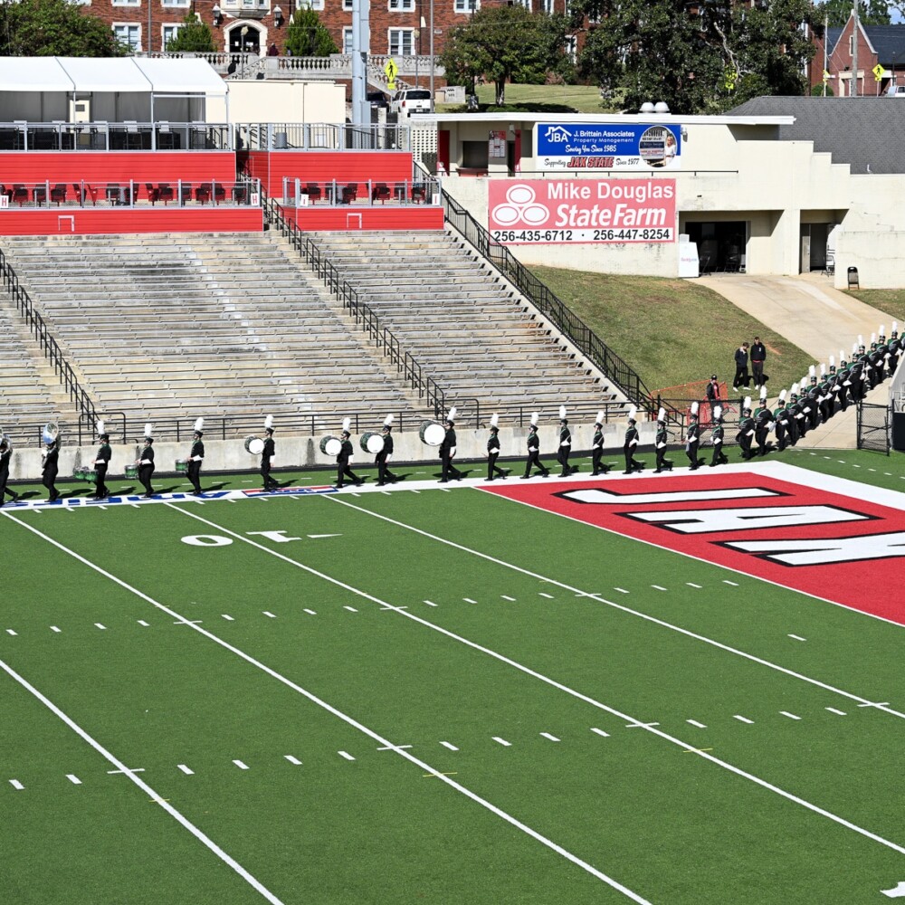 Hokes Bluff High School’s Green Machine Marching Band earned grand champion honors Saturday, Oct. 17, at Jacksonville State University’s Gem of the Hills Marching Invitational.
The competition was hosted by JSU’s Marching Southerners as a fundraiser for their upcoming trip to perform in the Rose Parade.
Hokes Bluff received superior ratings in all categories and won Best in Class AA awards for drum major, majorette, percussion and band.
The Green Machine also earned Best in Division A/AA honors in drum major, majorette and percussion before capping the competition by being named Grand Champion Band in Division A/AA.
By Alex Chaney.