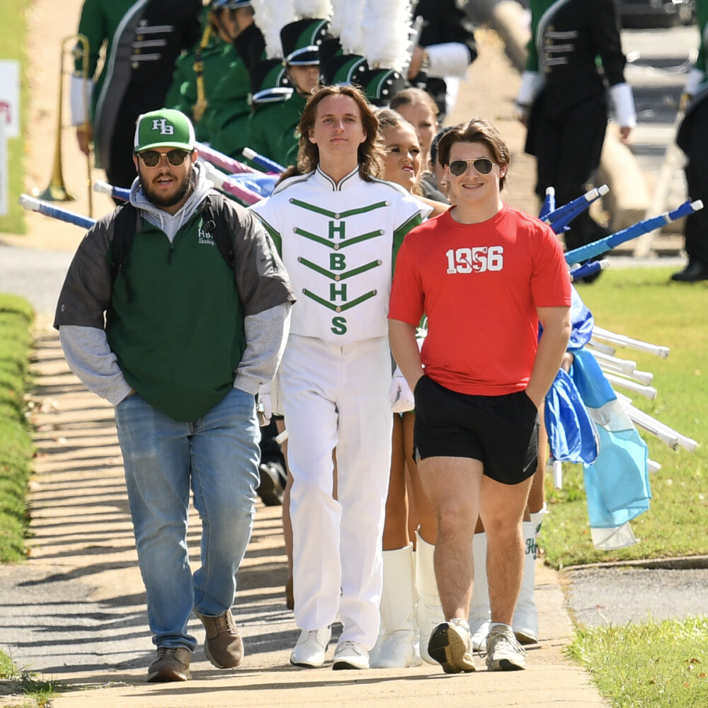 Hokes Bluff High School’s Green Machine Marching Band earned grand champion honors Saturday, Oct. 17, at Jacksonville State University’s Gem of the Hills Marching Invitational.
The competition was hosted by JSU’s Marching Southerners as a fundraiser for their upcoming trip to perform in the Rose Parade.
Hokes Bluff received superior ratings in all categories and won Best in Class AA awards for drum major, majorette, percussion and band.
The Green Machine also earned Best in Division A/AA honors in drum major, majorette and percussion before capping the competition by being named Grand Champion Band in Division A/AA.
By Alex Chaney.